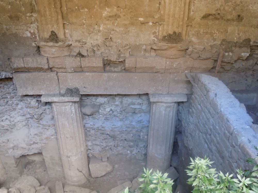Excavated walls of Palestrina. Roman columns are exposed from the surrounding brick.